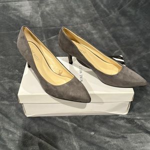 Gray suede Nine West pumps.
